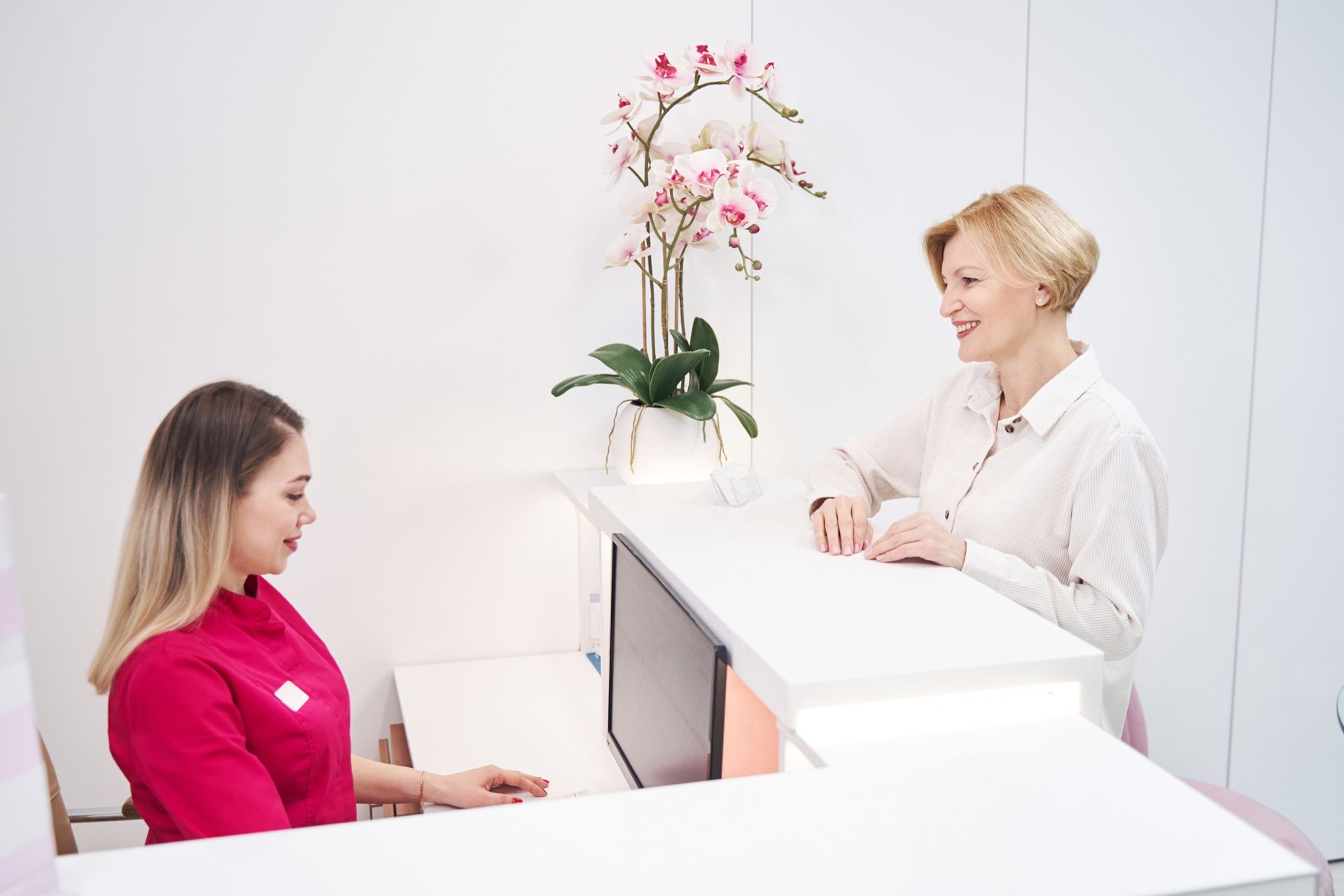 Reception desk in a modern salon, suitable for an article about website online booking